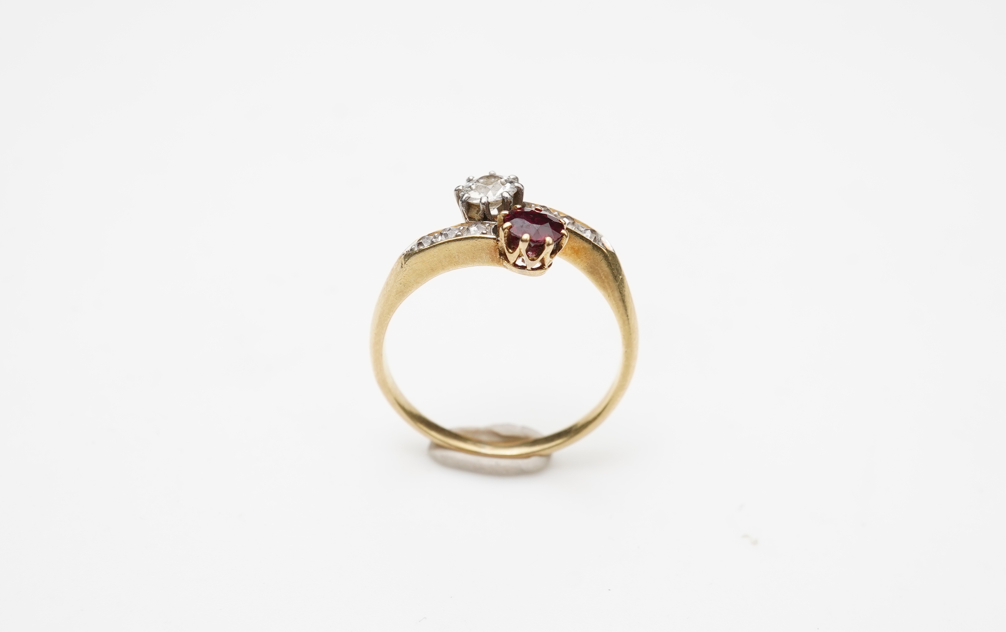 A ruby and diamond 'toi-et-moi' ring, early 20th century